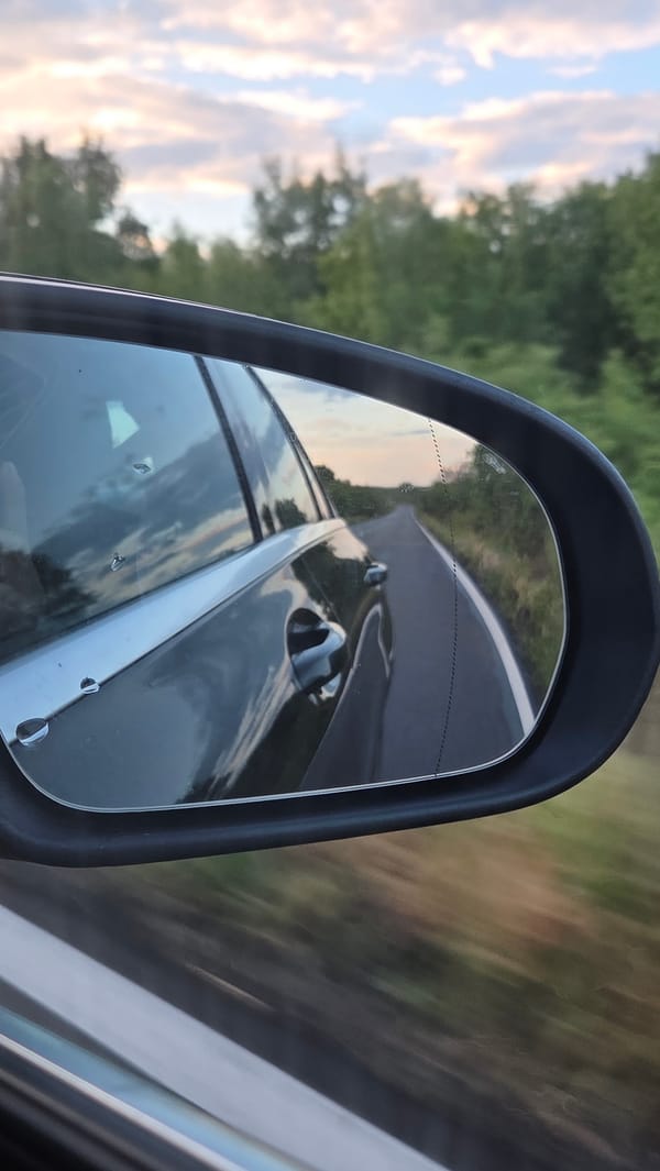 Driver captures side mirror reflection while traveling through Ravadinovo