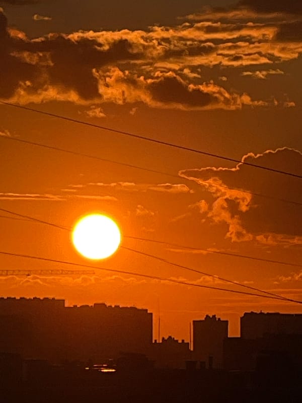 Sunset over a Russian city skyline, multiple angles
