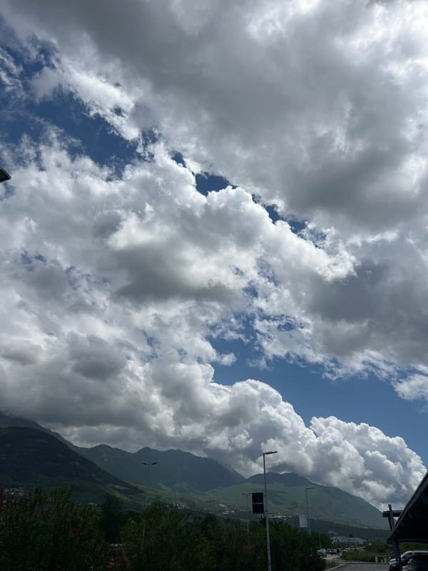 Woman enjoys fast food meal in car, Montenegro