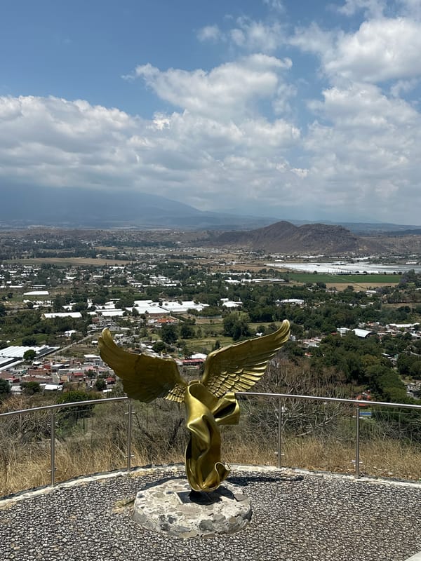 Golden eagle sculpture photographed atop Cerro de San Miguel, Atlixco