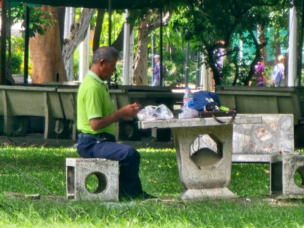 Quiet morning routines in a Bangkok park