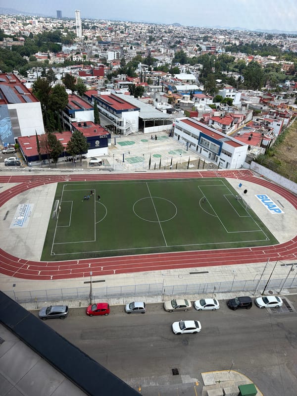 Aerial views document BUAP campus and surrounding neighborhood
