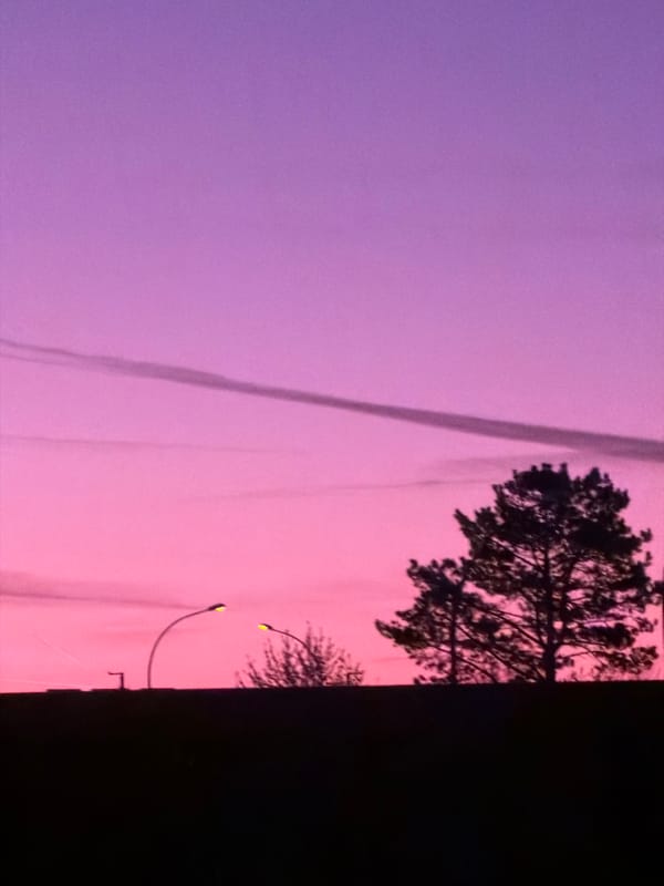 Purple-pink dawn sky observed over Leudelange, Luxembourg