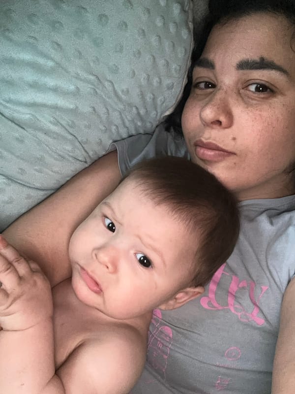 Mother and baby share quiet morning moments together