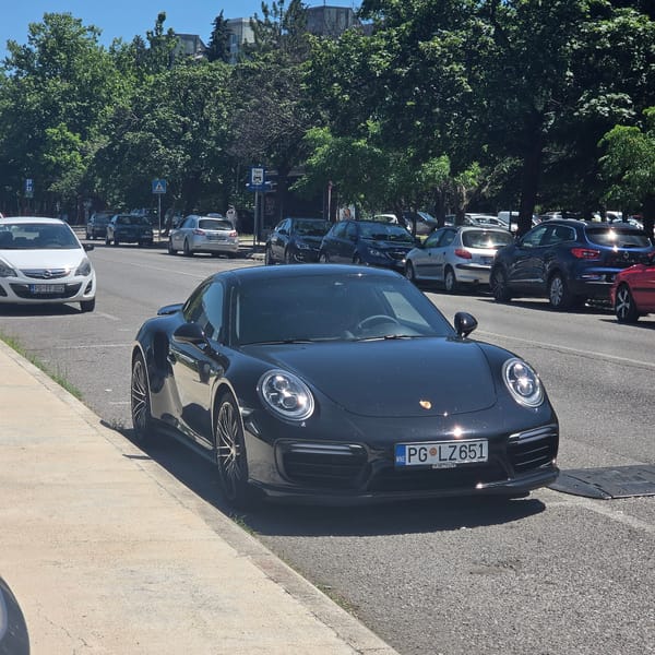 Black Porsche spotted on sunny Podgorica street