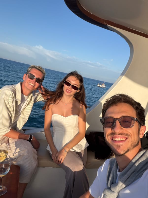 Three friends enjoy sunny boat trip off Larnaca coast