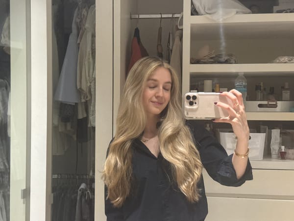 Woman takes late-night selfie in Mexico City closet