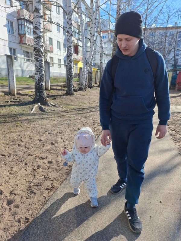 Family moments captured across Chaikovsky during spring afternoon