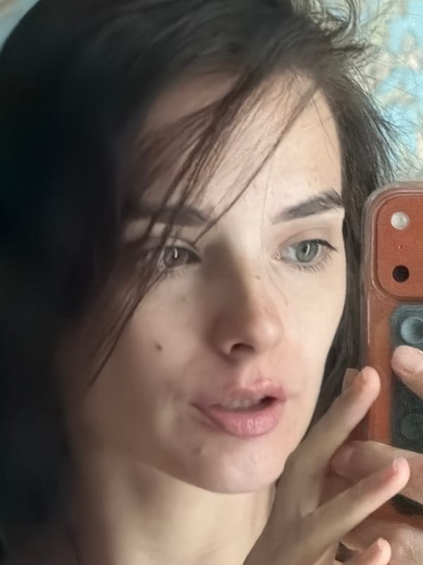 Selfies and indoor scenes against an overcast city backdrop