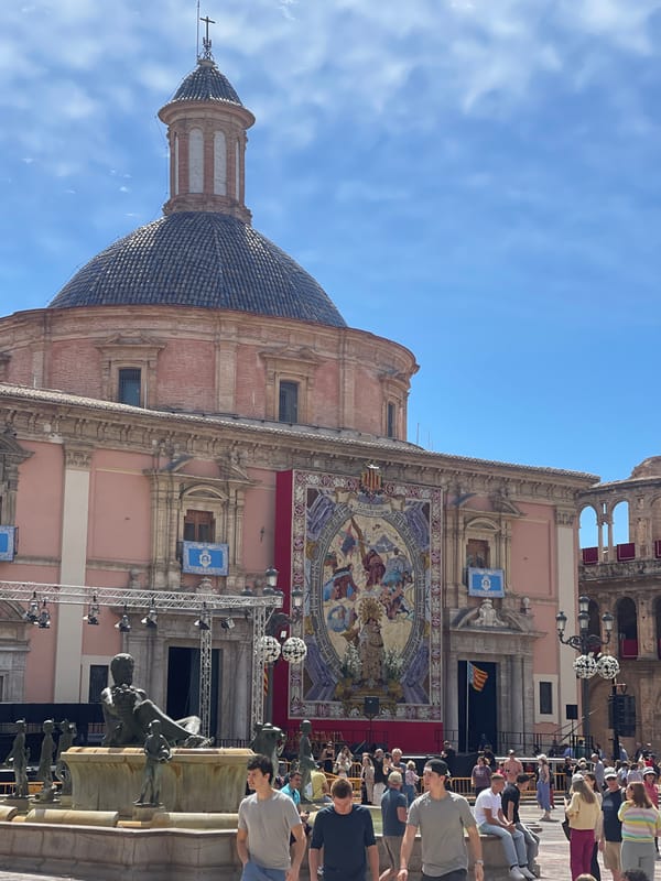Valencia's Plaza de la Virgen captured under cloudy skies
