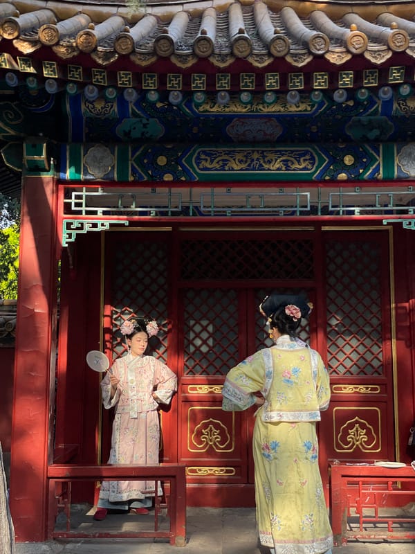 Women in traditional dress spotted at ornate Beijing building