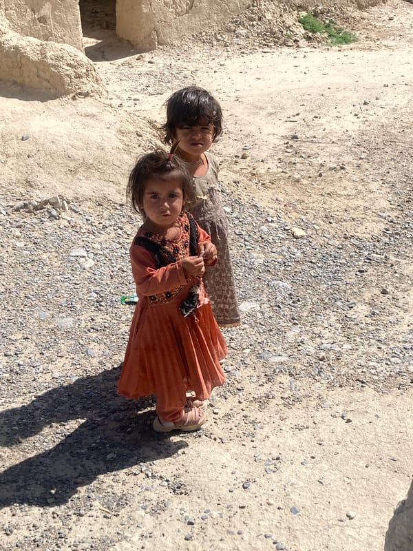 Two girls photographed in sunny Loralai, Pakistan