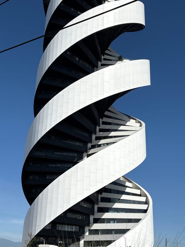 DNA helix-inspired skyscraper photographed in San Bernardino Tlaxcalancingo