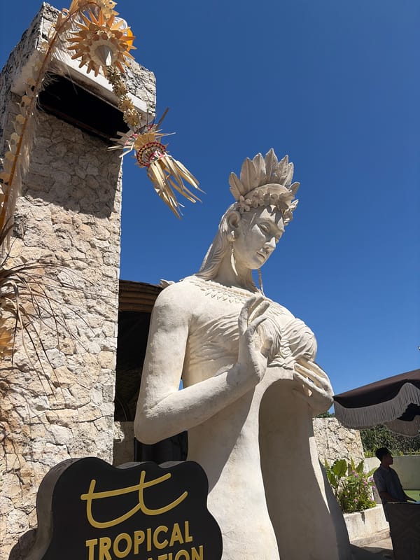 Cruising Kuta Selatan's cliff roads, temples, and stone statues