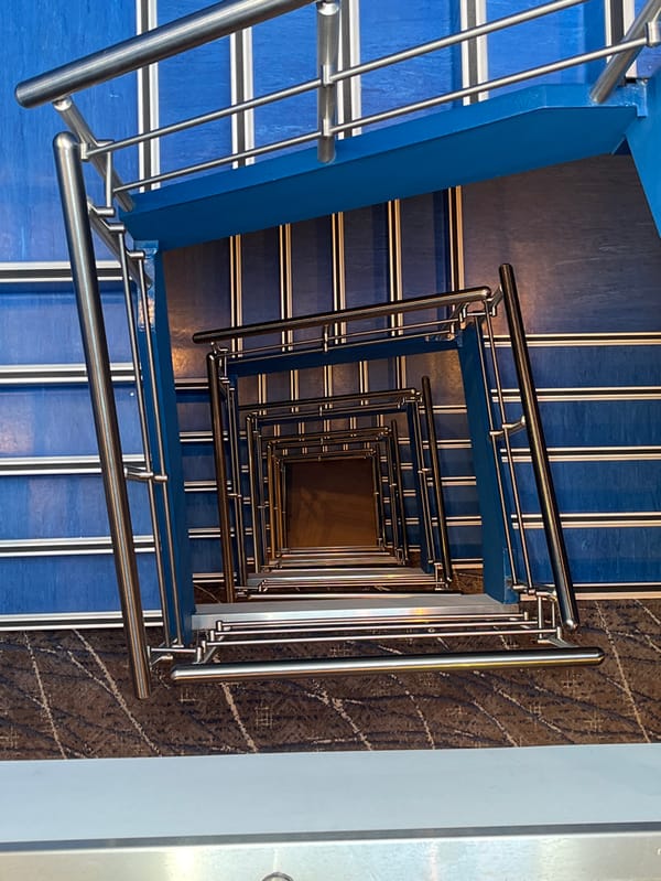 Blue spiral staircase photographed from above in Argentina