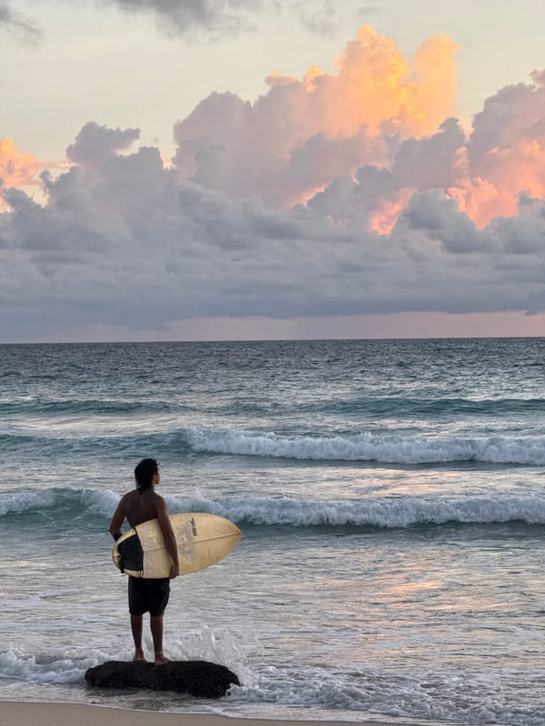 Surfer and sunset at Karon Beach, Phuket