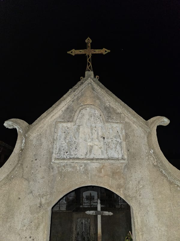 Nighttime documentation of weathered mausoleum in Capitán Pastene, Chile