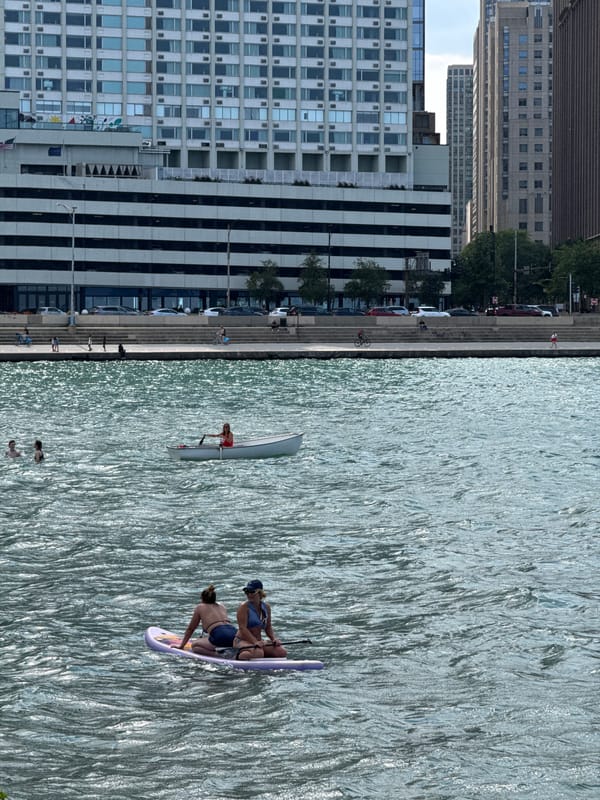 Paddleboarding on Lake Michigan with the Chicago skyline behind
