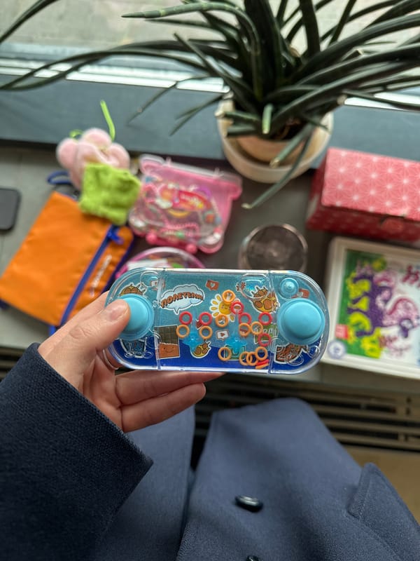 Person holds vintage water ring game in Moscow