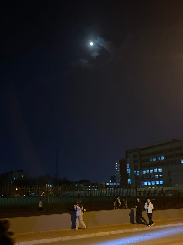 Nighttime street activity captured in Zhongtun, China