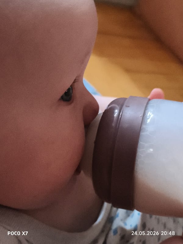 Baby feeding moment captured by witness