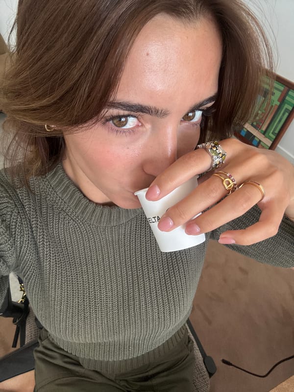 Woman with coffee cup photographed in Torres Vedras
