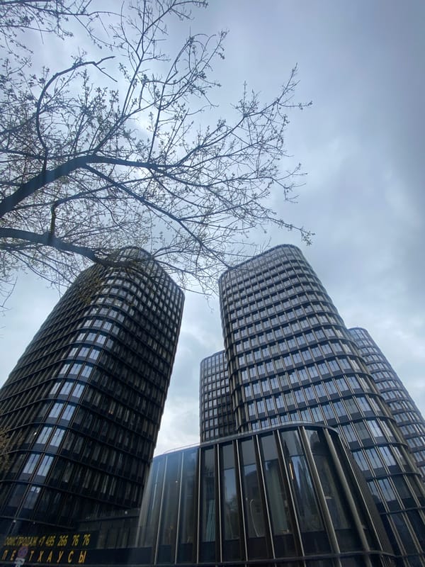 Modern skyscrapers photographed under overcast Moscow sky
