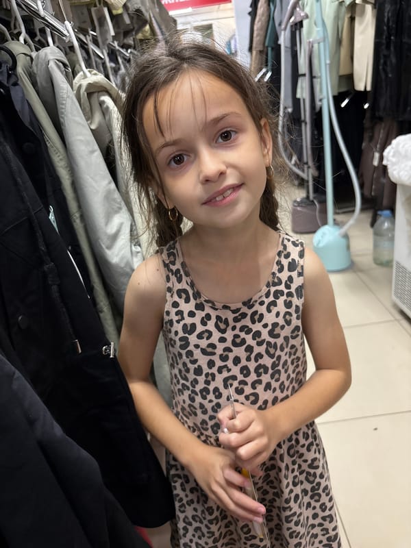 Inside a Blagoveshchensk retail store stocked with flowers and goods