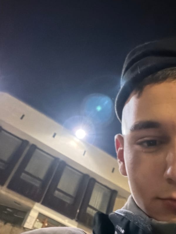 Young man documents evening stroll through Panagyurishte streets