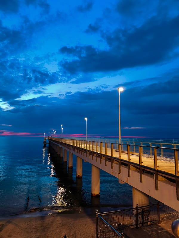 Zelenogradsk pier illuminated during Baltic Sea twilight