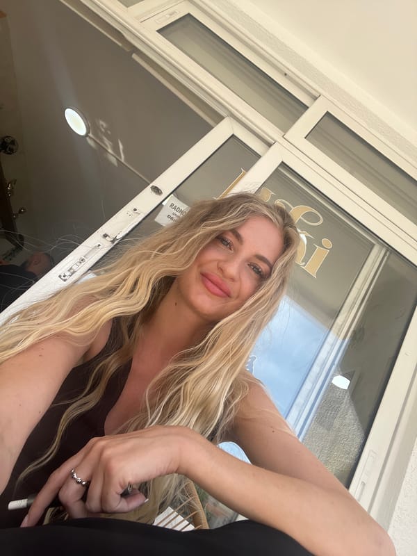 Tourist documents afternoon visit through selfies and street scenes in Budva