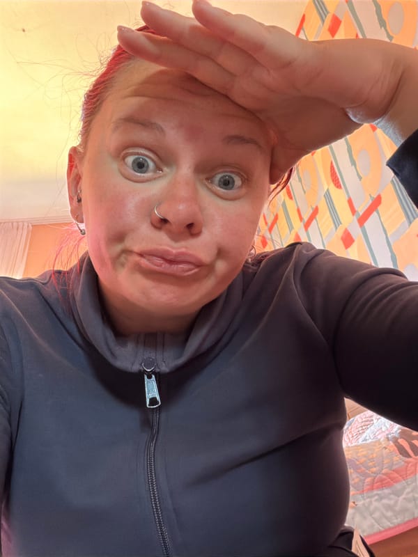 Woman takes morning selfies at home in Chaikovsky
