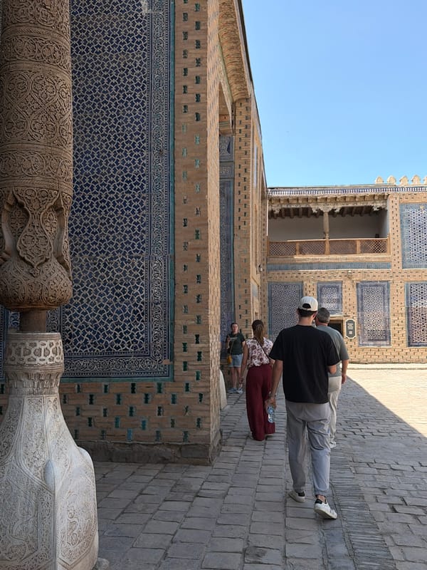 Morning tourism captured at Uzbekistan's historic Khiva complex