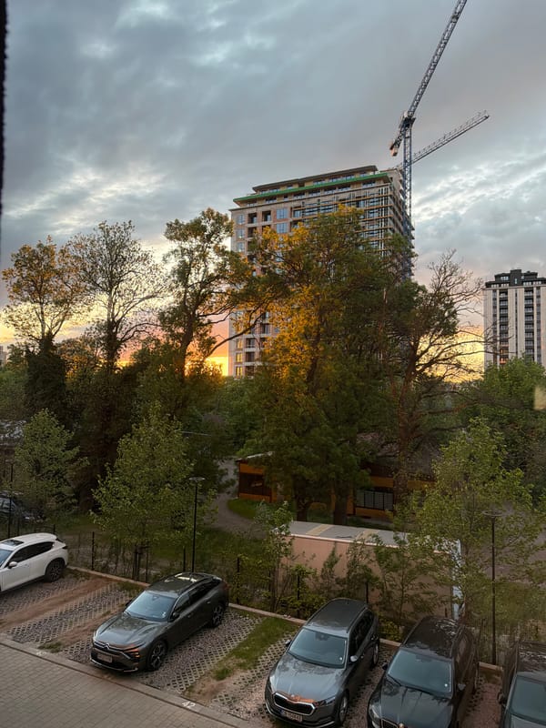 Sunset illuminates dramatic clouds over Sofia construction scene