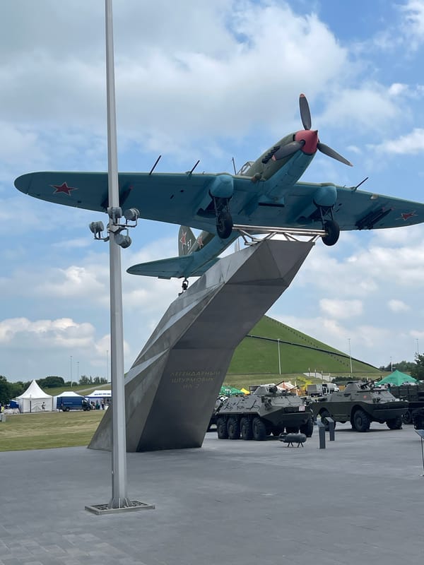 WWII memorial site in rural Belarus: tanks, aircraft, and monument