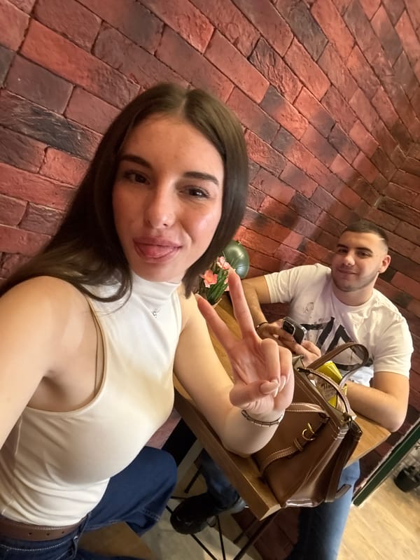 Two people sitting at table in Sofia indoor setting