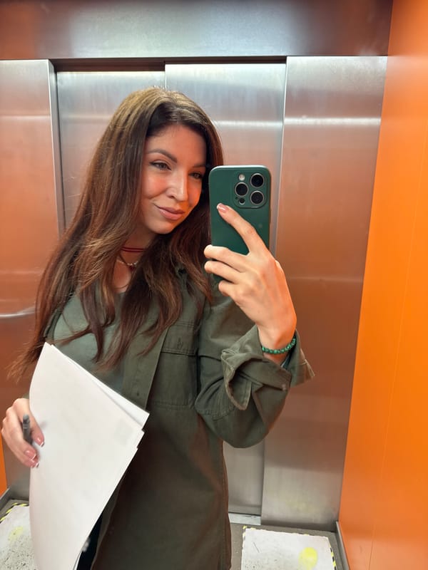 Woman takes selfie with papers in Kryvyi Rih elevator