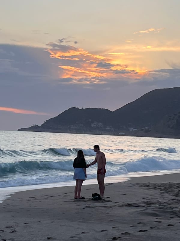Couple enjoys sunset moment on Alanya beach