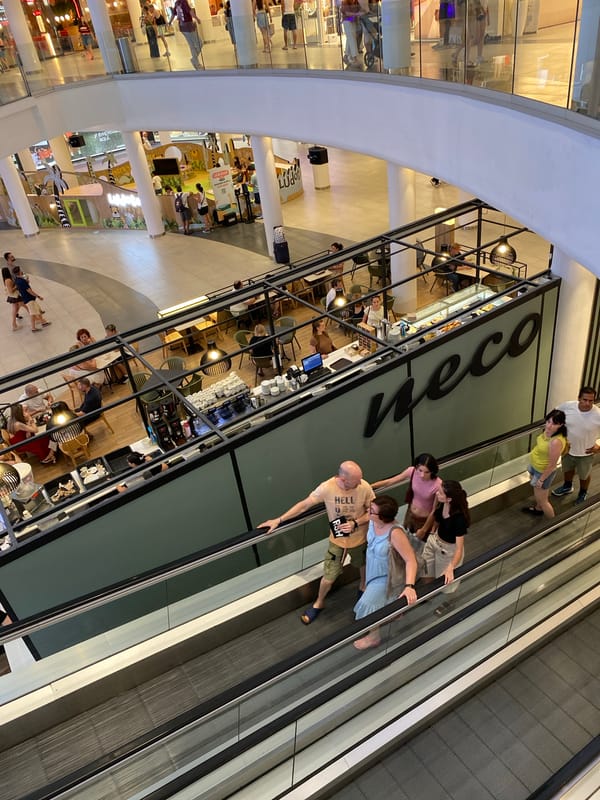 Browsing a busy Valencia mall on a Sunday afternoon