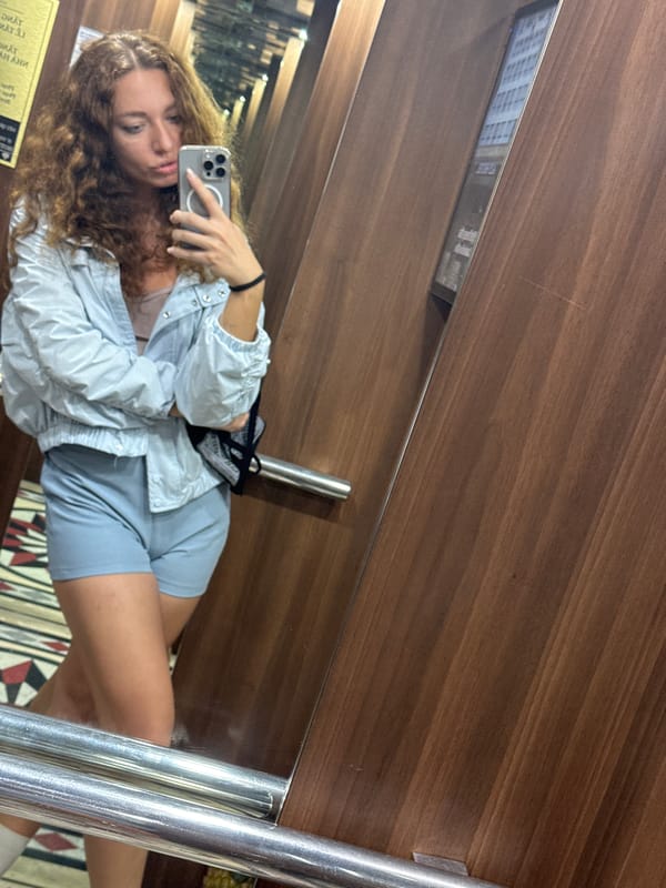 Elevator selfies and a portrait shot inside a Hà Nội building