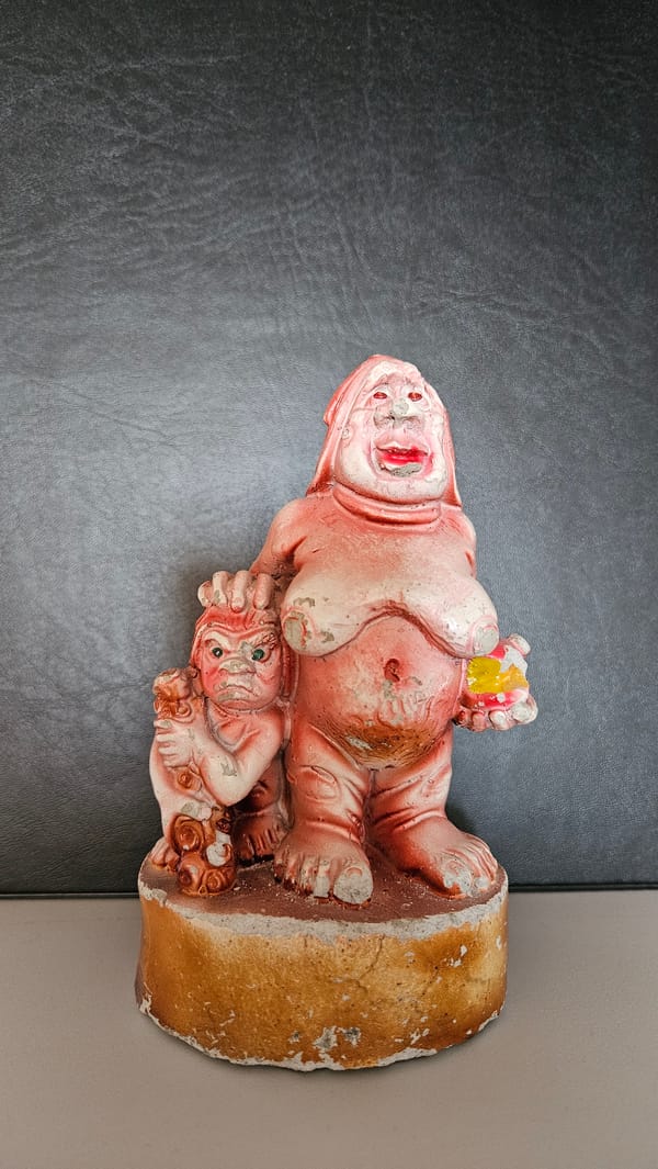 Witness documents weathered reddish statues depicting human figures