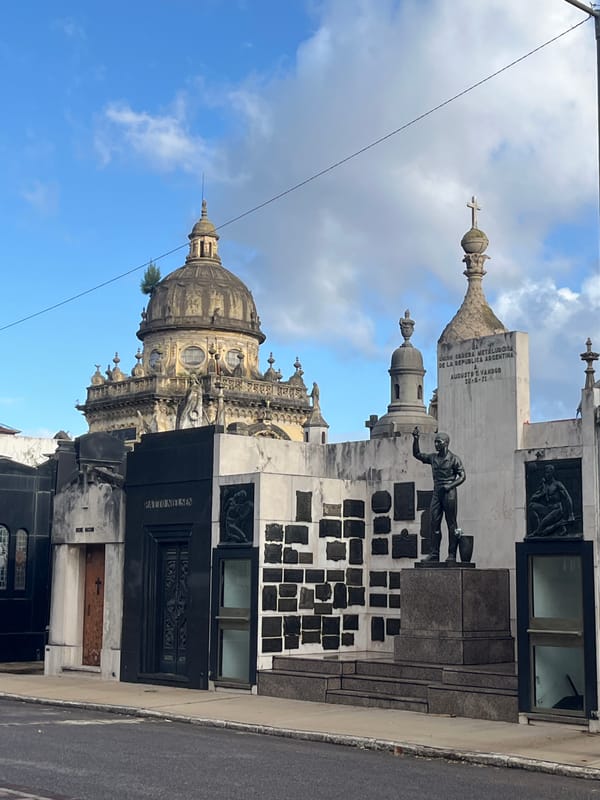 Tourist documents evening walk through historic Buenos Aires landmarks