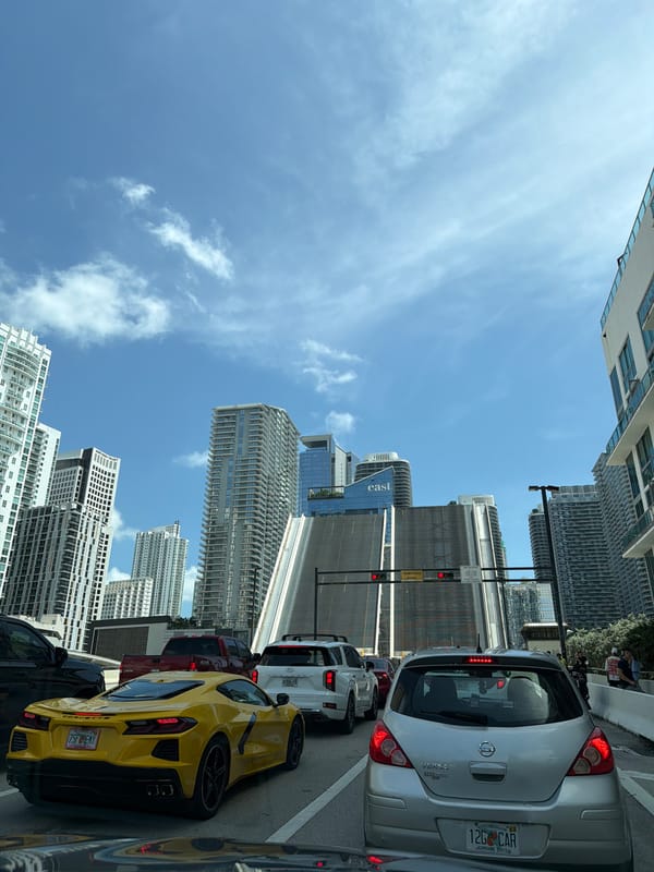 Miami drawbridge up, traffic stopped on a sunny afternoon