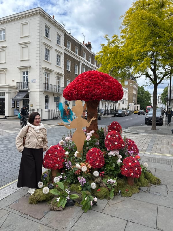 Elaborate floral displays documented outside London shops on Elizabeth Street