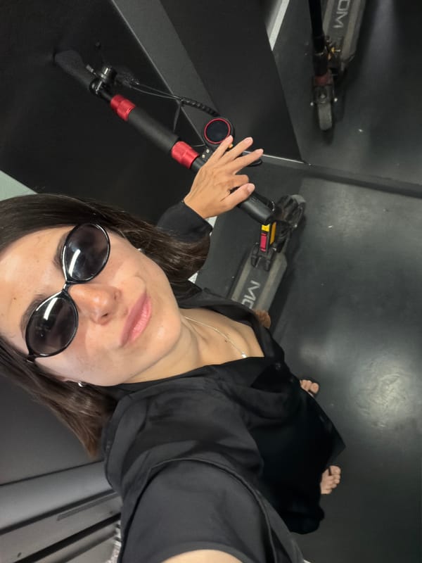Woman with electric scooter documented around Budva, Montenegro morning