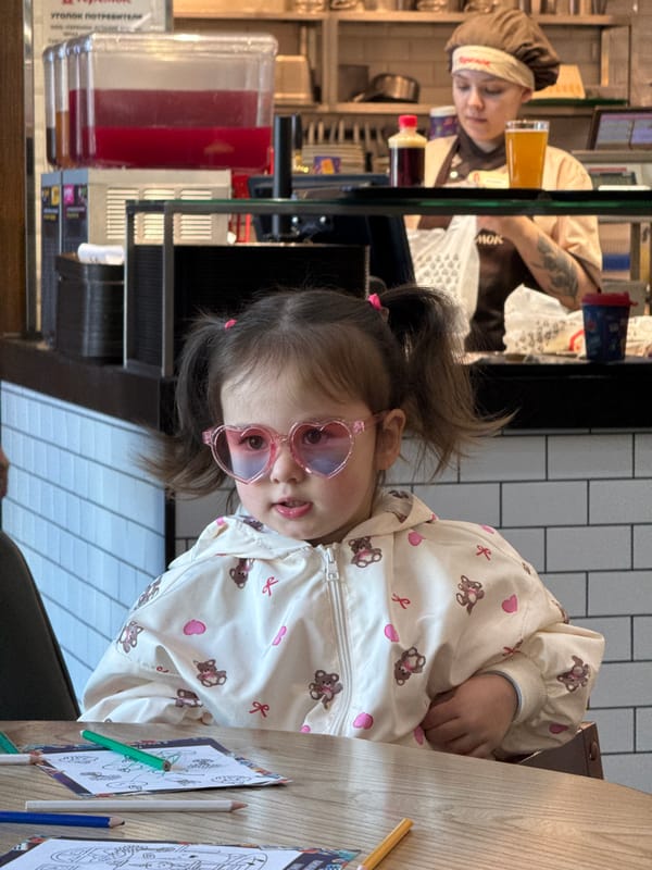 Child enjoys lunch with okroshka soup at Russian venue