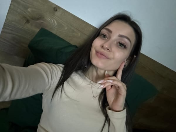 Woman takes selfie indoors in Reutov, Russia