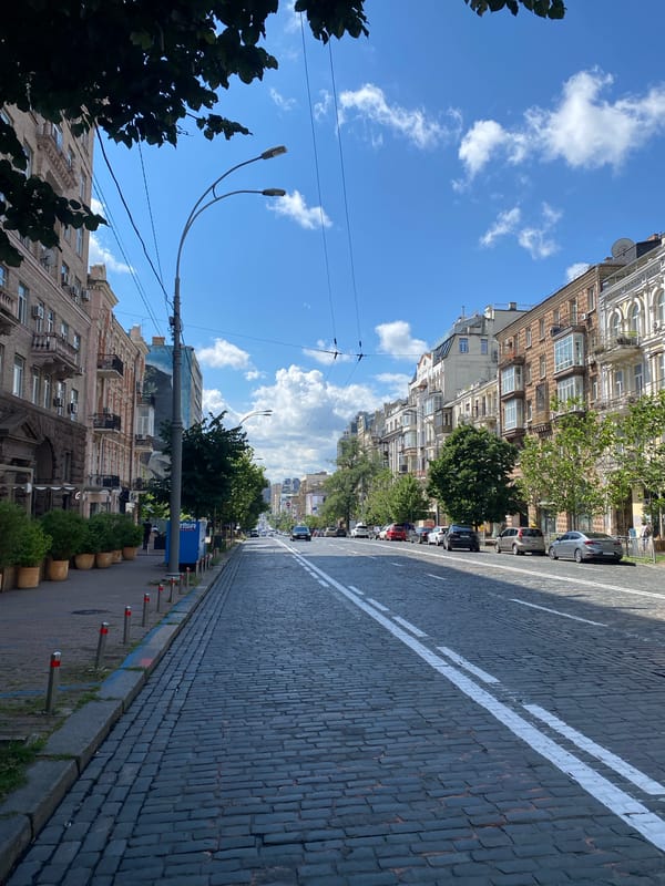 Sunny morning street scene along a historic Kyiv boulevard