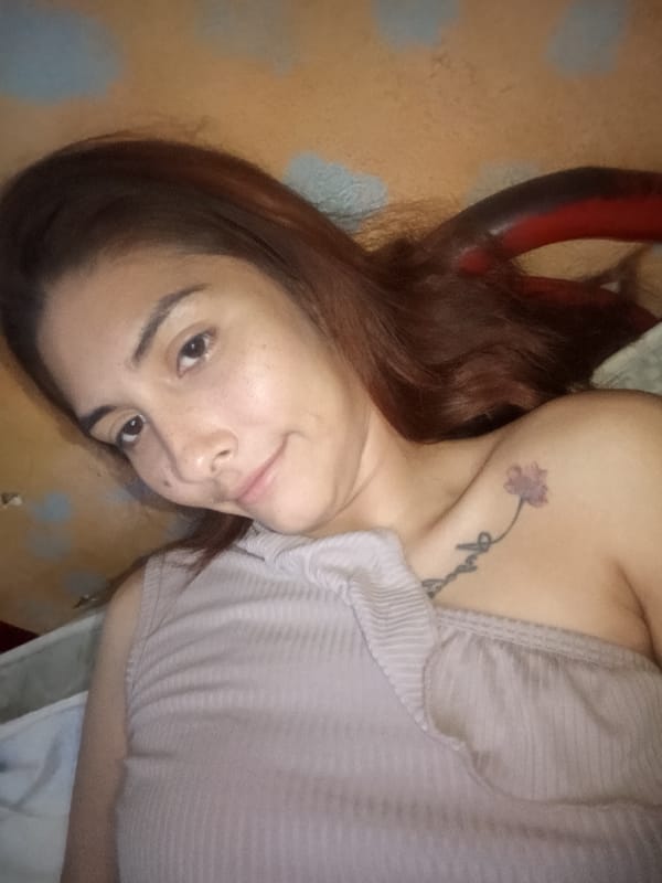 Woman photographed in bedroom in Juan Griego, Venezuela