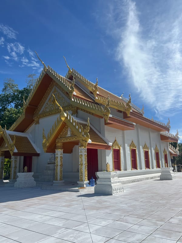 Koh Phangan temple visit: statues, bells, and ornate grounds